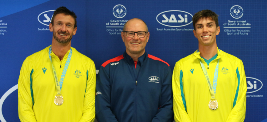 Two Beach Volley players with Coach