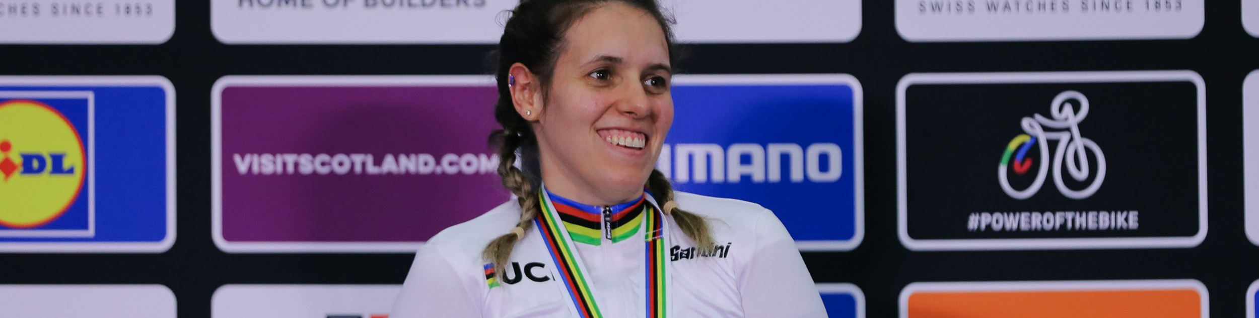 Amanda Reid smiling with a medal around her neck