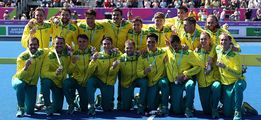 Mens Hockey team with gold medals