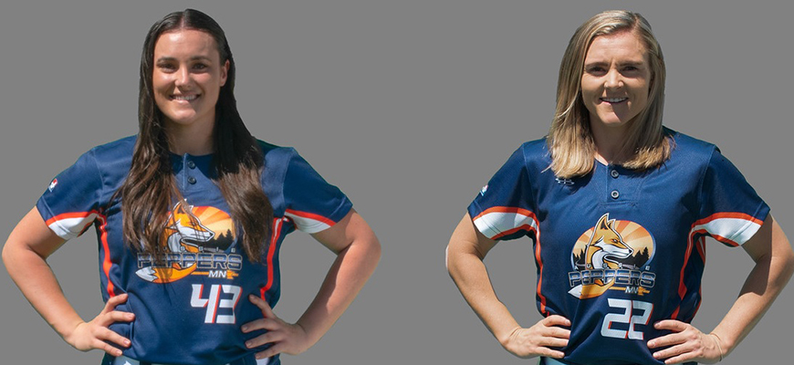 Belinda and Maddie standing together in softball uniforms