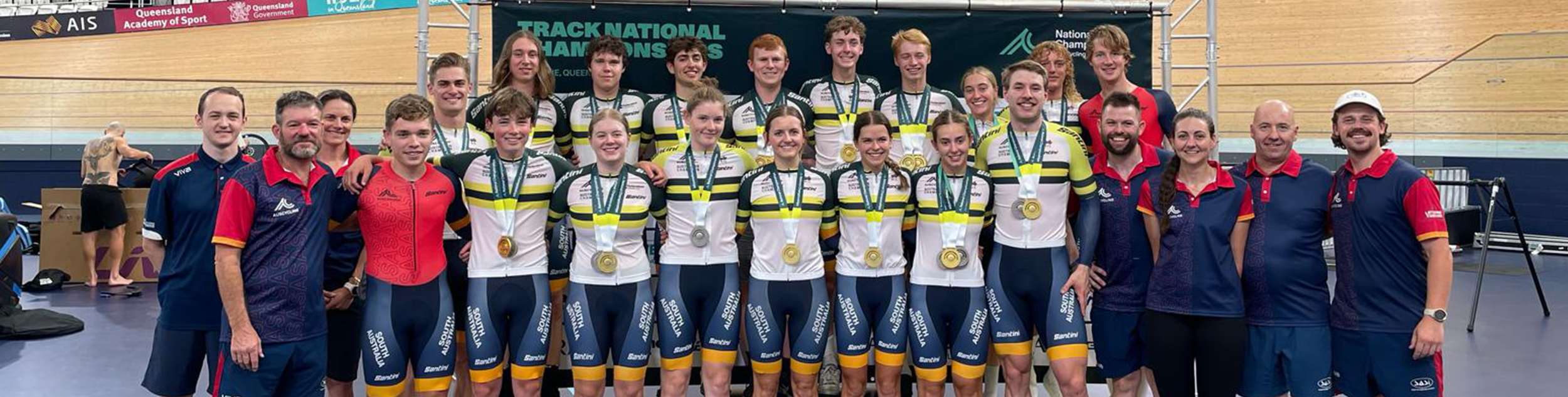 Athletes and coaches group photo